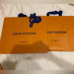 2 medium size LV shopping bags